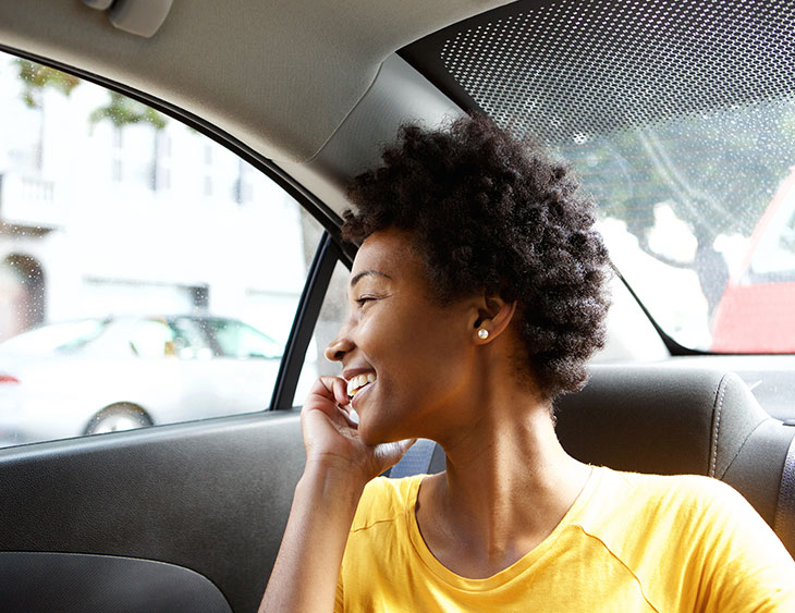 Envy-Boutique-Travel-Blog-Happy-Traveller-In-Taxi