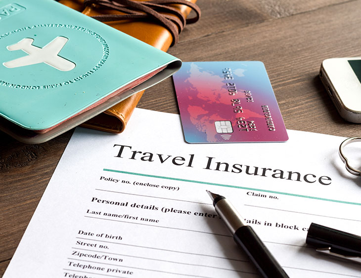 Envy-Boutique-Travel-Blog-Travel-Insurance-Paperwork